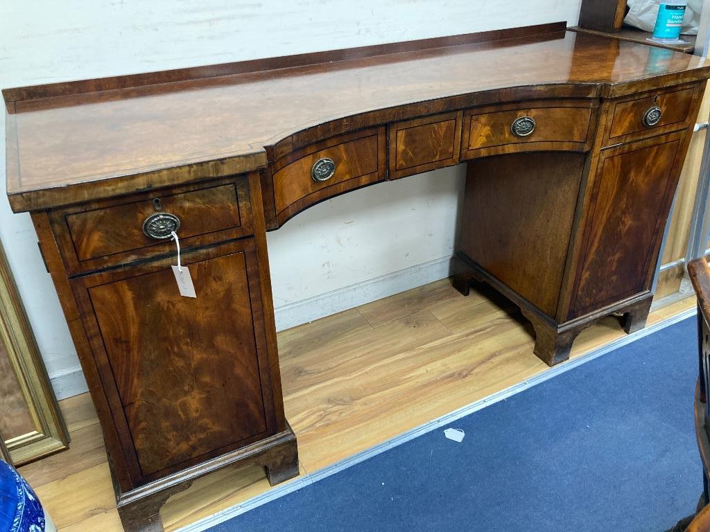 A George IV ebony banded concave front mahogany sideboard, length 173cm, depth 60cm, height 92cm